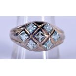 A SILVER AND AQUA RING. Size Q/R, stamped 925, weight 5.4g.
