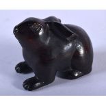 A JAPANESE WOOD NETSUKE CARVED AS A RABBIT. 2.8cm x 3.5cm, weight 14.5g