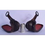 A PAIR OF LATE 18TH CENTURY JAPANESE EDO PERIOD IRON AND DOUBLE COLOUR LACQUER STIRRUPS Abumi, with