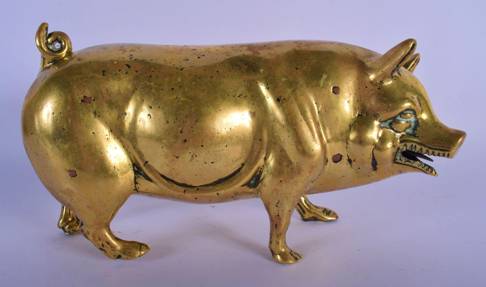 A HEAVY 18TH/19TH CENTURY EUROPEAN BRONZE FIGURE OF A STANDING PIG modelled scowling. 22 cm x 12 cm.