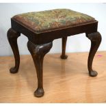 A GEORGE III UPSHOLSTERED STOOL. 47 cm x 40 cm.