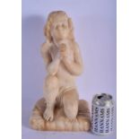 A 19TH CENTURY EUROPEAN CARVED ALABASTER STONE FIGURE OF A BOY modelled in prayer. 37 cm x 18 cm.