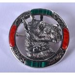 A SCOTTISH STYLE SILVER AND AGATE BROOCH IN THE FORM OF A SCOTTIE DOG. 3.8cm diameter, weight 11.6g