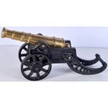 A large cast iron and brass cannon 22 x 48cm.