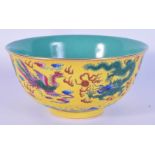 A Small Chinese yellow ground bowl decorated with dragons and peacocks 8 x 16cm.