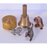 A collection of metal items including a small brass cannon stamped HMS Victory, trench art bell, ste