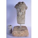 A 19TH CENTURY CONTINENTAL CARVED STONE GARDEN SCULPTURE upon a rocky outcrop. 45 cm x 18 cm.