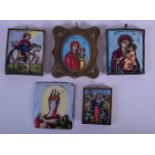 FIVE 18TH CENTURY RUSSIAN ENAMELLED PAINTED ICONS in various forms and sizes. Largest 5.5 cm x 5 cm.