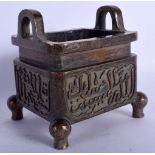 A CHINESE TWIN HANDLED ISLAMIC MARKET BRONZE CENSER 20th Century, decorated with banding of scriptur