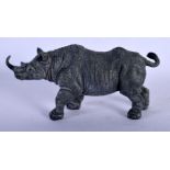 A CONTEMPORARY COLD PAINTED BRONZE RHINOCEROS. 14 cm x 7 cm.