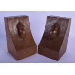 A PAIR OF ROBERT THOMPSON MOUSEMAN CARVED WOOD MOUSE BOOKENDS. Each 16 cm x 8 cm.