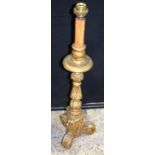 An antique large gilded plaster and wood candlestick converted to a lamp 81 x 22 cm.