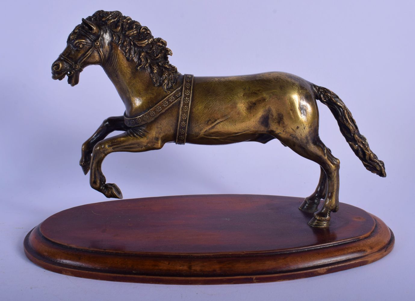 A FINE 18TH CENTURY EUROPEAN BRONZE FIGURE OF A ROAMING HORSE After the Antiquity, modelled leaping