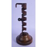 AN 18TH CENTURY PIG TAIL CURLY TWIST CANDLESTICK. 22 cm high.