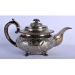 A GEORGE III IRISH SILVER TEAPOT AND COVER decorated with foliage. Dublin 1782. 914 grams. 31 cm x 1