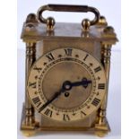 A mid century Smiths open face brass carriage clock 12cm.