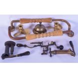 A collection of brass/metal items candle sticks, desk bell, clamps, hole punches, instruments etc (