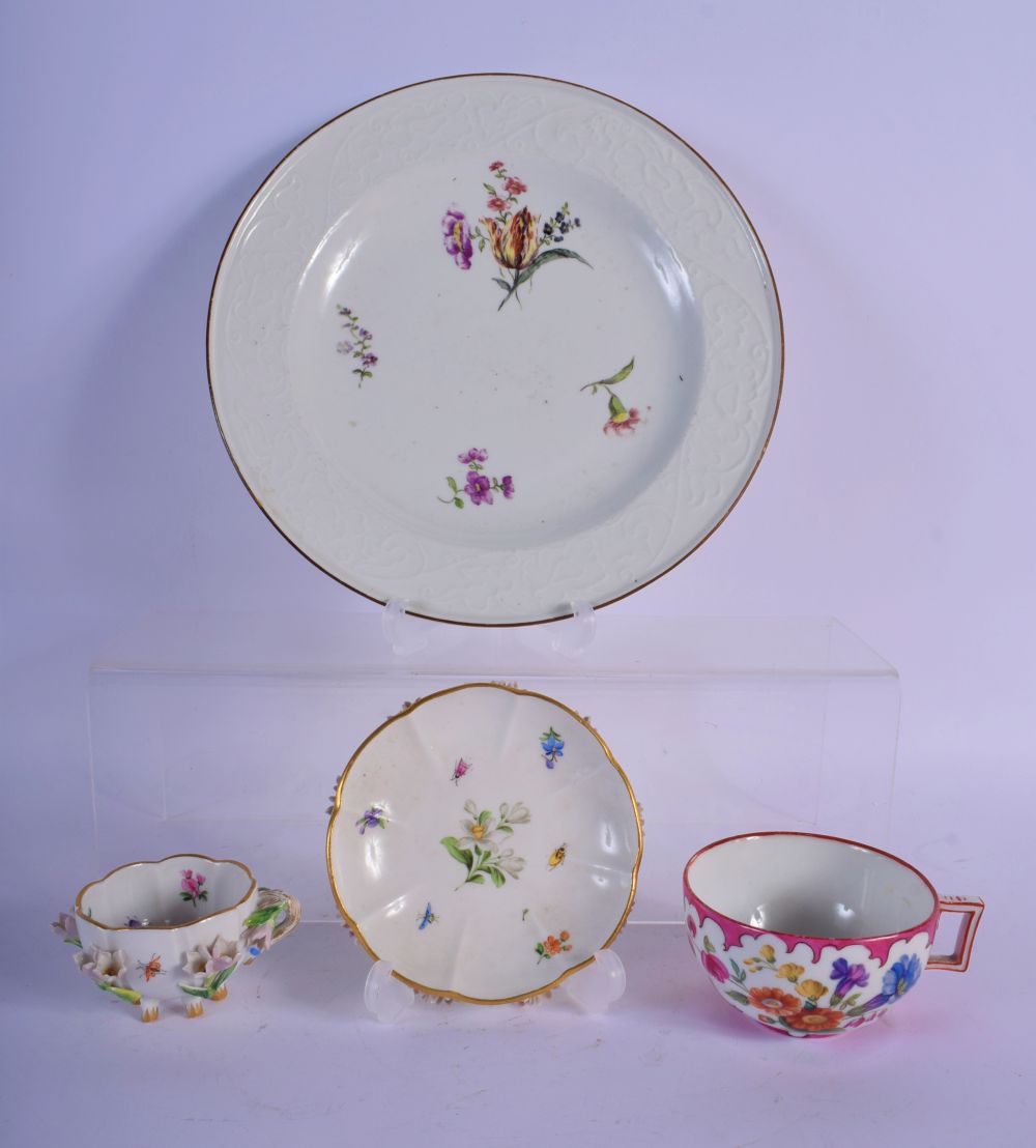 MEISSEN SIX FOOTED FLORAL ENCRUSTED CUP AND SAUCER PAINTED WITH FLOWERS, A MEISSEN TEACUP PAINTED WI