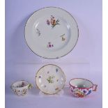 MEISSEN SIX FOOTED FLORAL ENCRUSTED CUP AND SAUCER PAINTED WITH FLOWERS, A MEISSEN TEACUP PAINTED WI