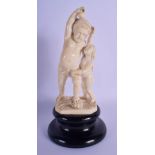 A RARE 19TH CENTURY EUROPEAN IVORY FIGURE OF ADAM AND EVE modelled holding the fabled apple above hi