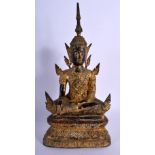 AN 18TH/19TH CENTURY THAI SOUTH EAST ASIAN GILDED AND LACQUERED BRONZE BUDDHA modelled upon a triang