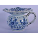 A 17TH/18TH CENTURY CHINESE BLUE AND WHITE PORCELAIN SPITTOON Yongzheng/Qianlong, painted with flowe