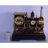 A LARGE CONTINENTAL STEAM LOCOMOTIVE NOVELTY TRAIN CLOCK with track. 42 cm x 28 cm. (2)