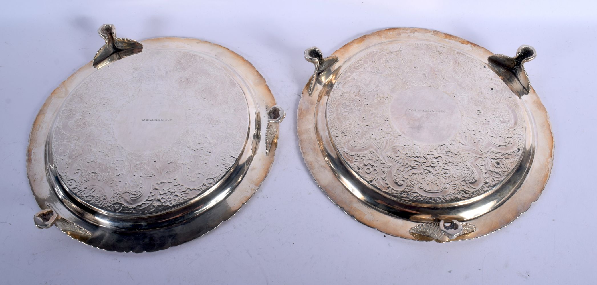 A PAIR OF 19TH CENTURY CONTINENTAL SILVER SALVES by Welles Celston & Co. 1144 grams. 24 cm wide. - Image 2 of 3