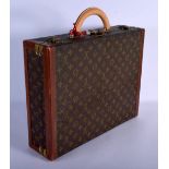 A LOUIS VUITTON SUITCASE. 42 cm x 34 cm x 12 cm.