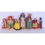 A collection of small vintage dolls plastic, terracotta and fabric largest 19cm. (7).