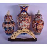 THREE 19TH CENTURY JAPANESE MEIJI PERIOD IMARI VASES together with a Meiji period ivory okimono. Lar