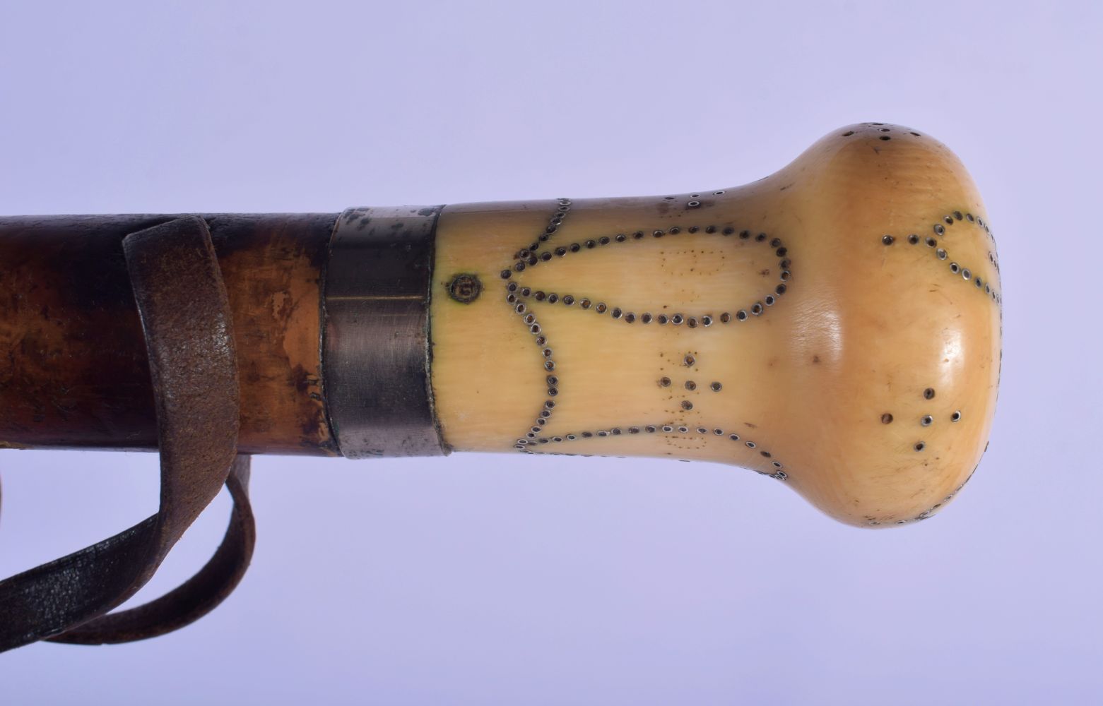 AN EARLY 18TH CENTURY CARVED IVORY PIQUE WORK SILVER INLAID IVORY WALKING CANE C1701. 85 cm long.