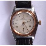 A ROLEX OYSTER BLACK DIAL WRISTWATCH WITH A ROSE GOLD BEZEL AND CROWN. Serial No ,Dial 3.7cm (incl