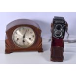 An Art Deco design wooden mantle clock together with a Rolleiflex vintage camera 21 x 27 cm (2).