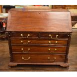 A FINE AND RARE ANTIQUE MAHOGANY MINIATURE BUREAU modelled after a Georgian original, possibly a sal