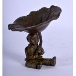 A JAPANESE BRONZE OF A BOY HOLDING ALOFT A LILY PAD. 6.4cm x 6.2cm, weight 124.7g