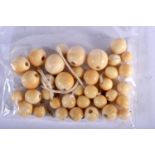 A QUANTITY OF BONE BEADS. Largest bead 15.8mm,weight 51g (qty)