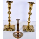 A Scottish brass Luckinbooth chamberstick dated 1703 together with a pair of antique brass candle st