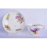 AN EARLY 19TH CENTURY ENGLISH BREAKFAST CUP AND SAUCER painted with flowers. Saucer 14 cm wide. (2)