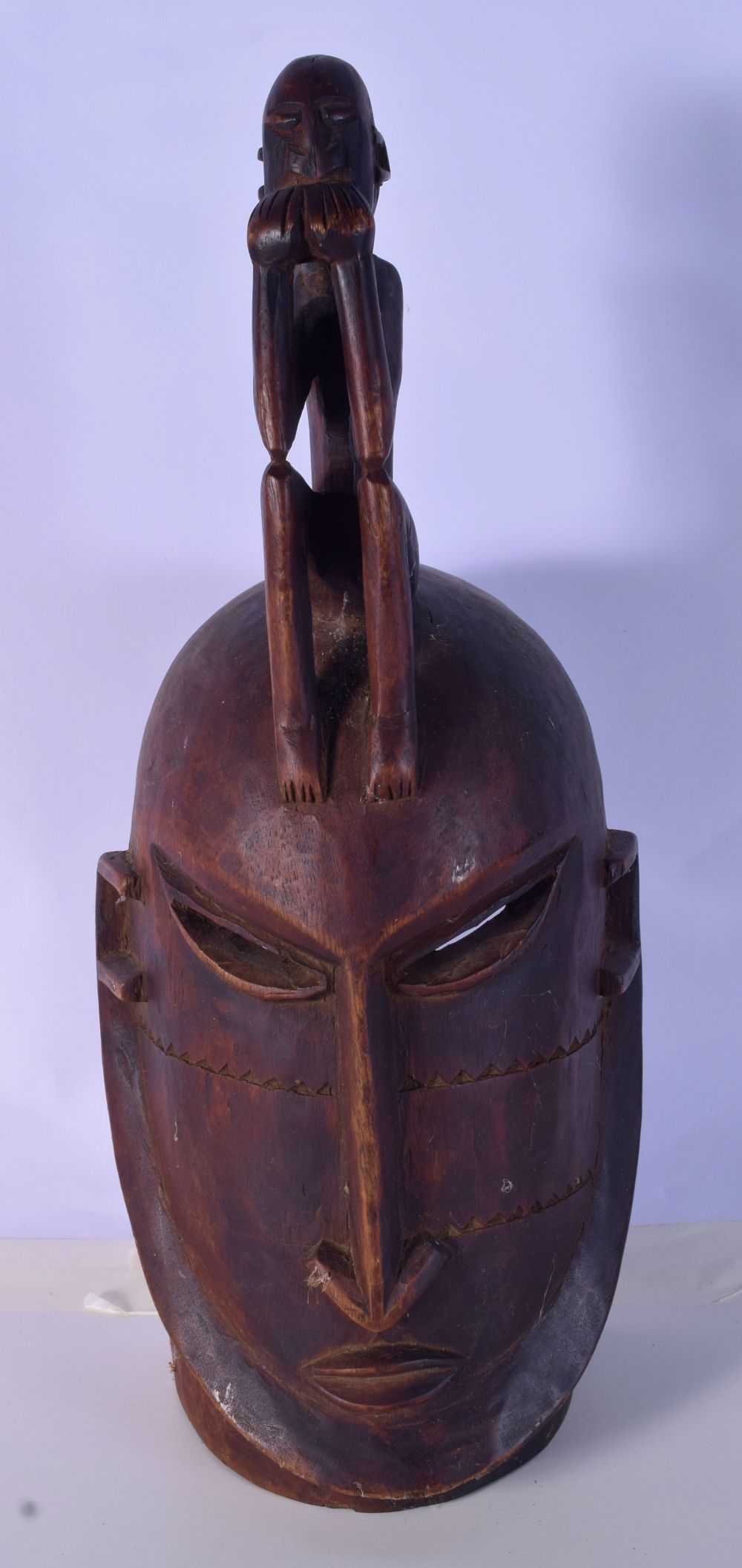 A collection of Tribal items including a feeding bowl, Yoruba mask, fly swats and a middle Eastern p - Image 4 of 6