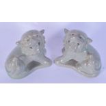 A pair of Chinese porcelain celadon Buddhistic lions 10 x 12cm (2).