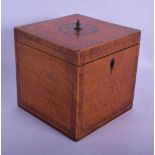 A GEORGE III MAHOGANY SQUARE FORM TEA CADDY decorated with a central shell form motif. 13 cm x 13 cm