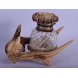 AN ANTIQUE STAG ANTLER INKWELL. 11 cm x 11 cm .