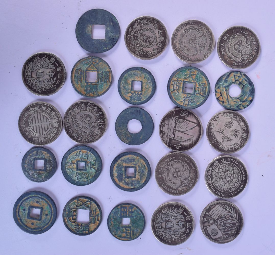A collection of white metal Chinese coins (24).