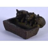 A JAPANESE BRONZE MODELLED AS THREE PIG AT A TROUGH 3.6cm x 4.4cm x 3.4cm, weight 101.9g