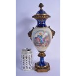 A 19TH CENTURY FRENCH PARIS PORCELAIN VASE AND COVER possibly Sevres, painted with lovers within lan