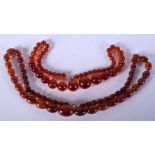A VINTAGE AMBER TYPE NECKLACE. 58 grams. 60 cm long.