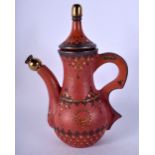 A TURKISH TOPHANE POTTERY COFFEE POT decorated with motifs. 22 cm high.