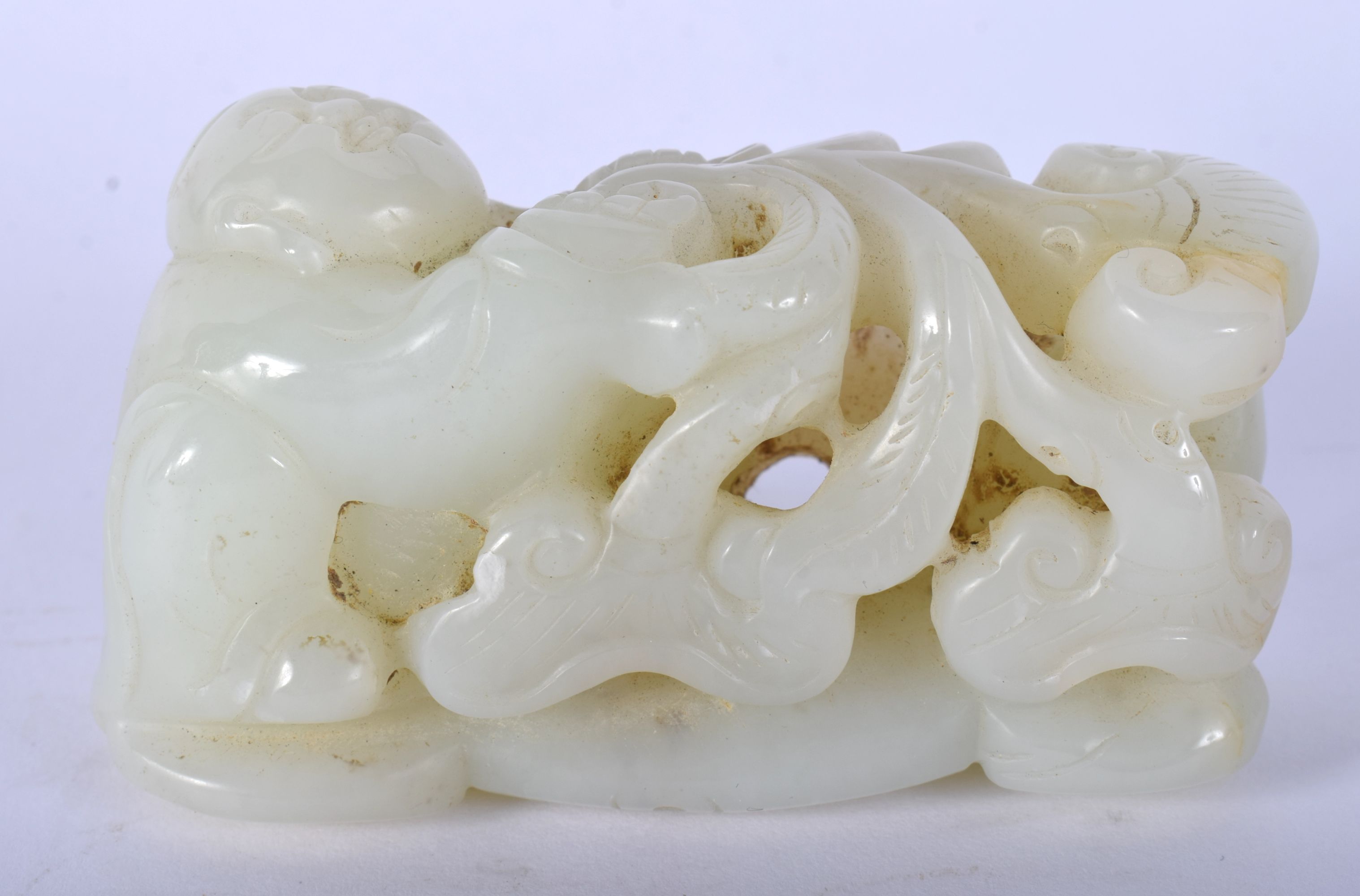 A CHINESE CARVED GREENISH WHITE JADE FIGURE OF A BOY 20th Century, modelled holding lingzhi fungus. - Image 2 of 12