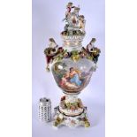 A LARGE ANTIQUE DRESDEN PORCELAIN VASE AND COVER with stand, painted with figures. 60 cm x 18 cm.
